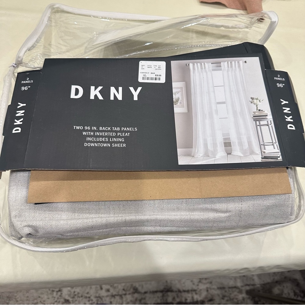 DKNY Two 96” Back Tab Sheer Panels with Lining